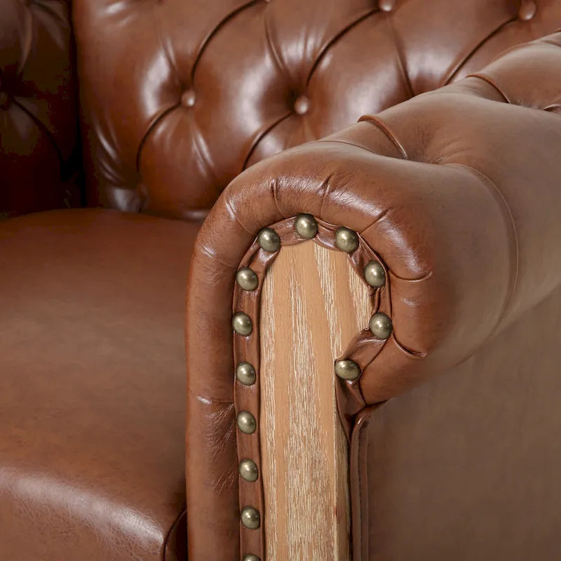 Fauteuil club capitonné