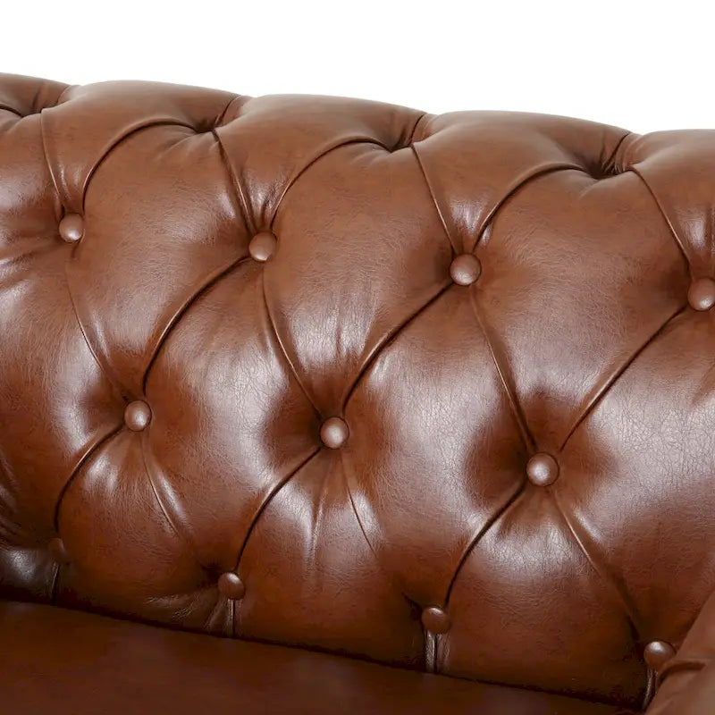 Fauteuil club capitonné