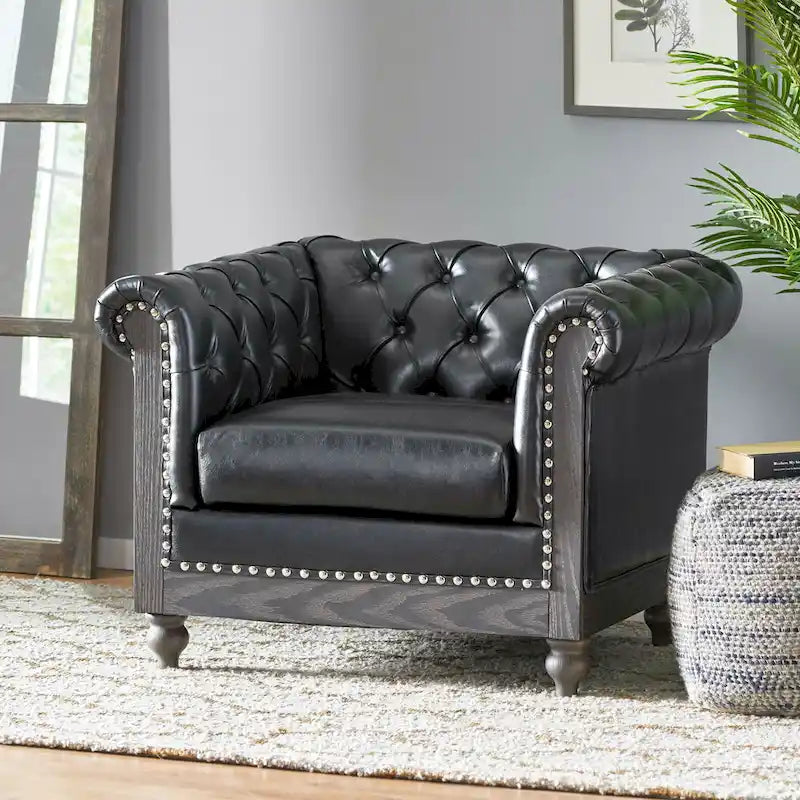 Fauteuil club capitonné