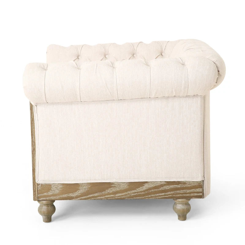 Fauteuil club capitonné
