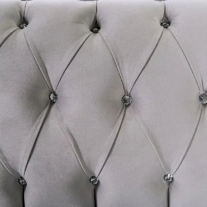 Canapé en tissu aspect velours avec capitonnage à boutons